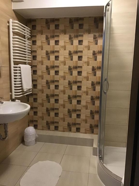 Kúpeľňa v ubytovaní Młynowa - Apartamenty Centrum New