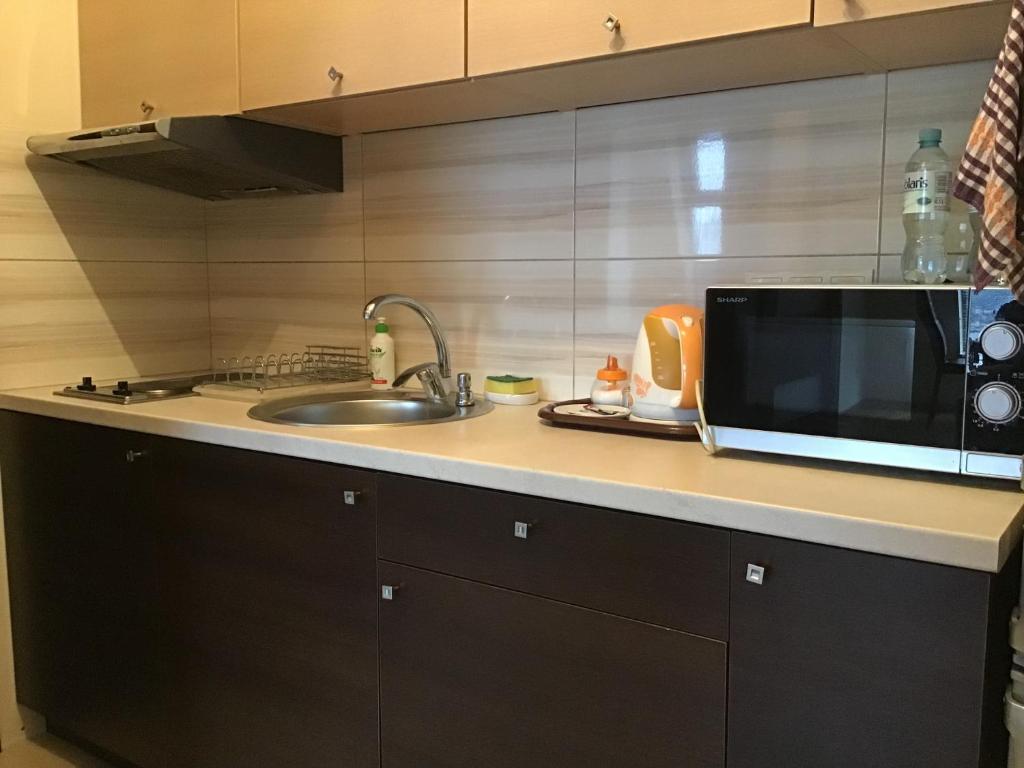 Kuchyňa alebo kuchynka v ubytovaní Młynowa - Apartamenty Centrum New