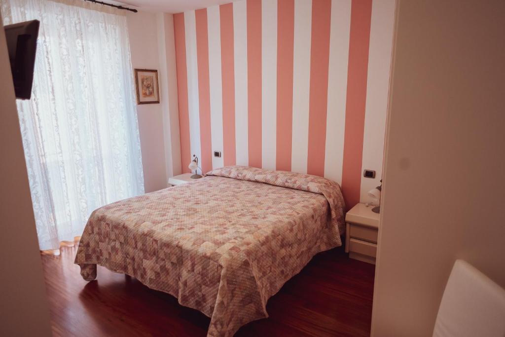 Postel nebo postele na pokoji v ubytování Mare DiVino