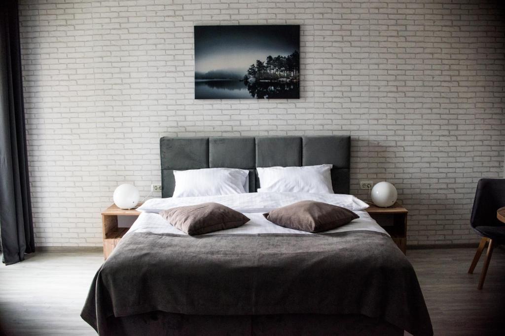 Postel nebo postele na pokoji v ubytování COMPLEX LIVING