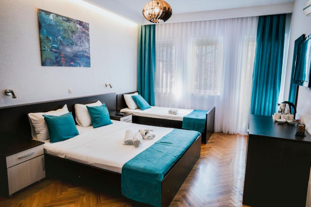 Postel nebo postele na pokoji v ubytování Villa Stefano