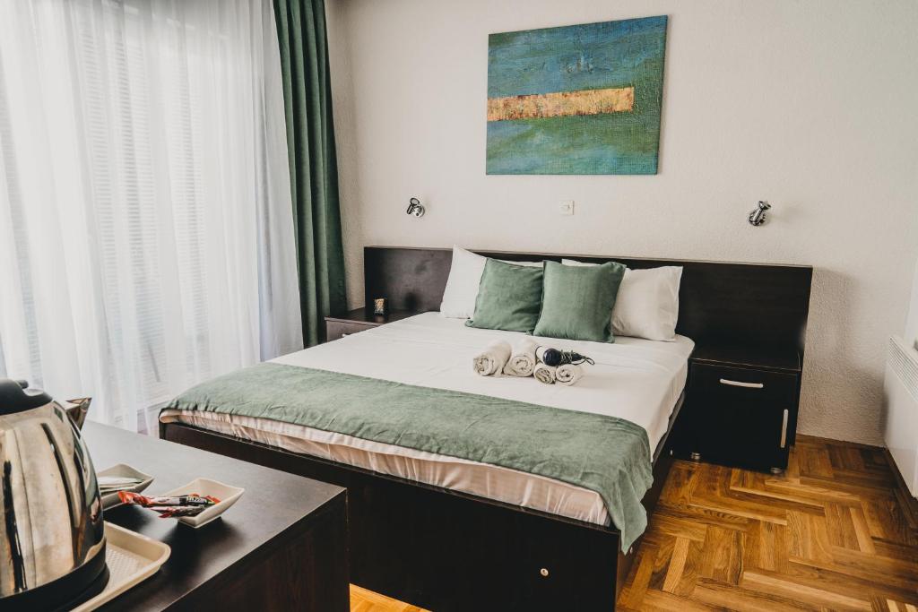 Postel nebo postele na pokoji v ubytování Villa Stefano
