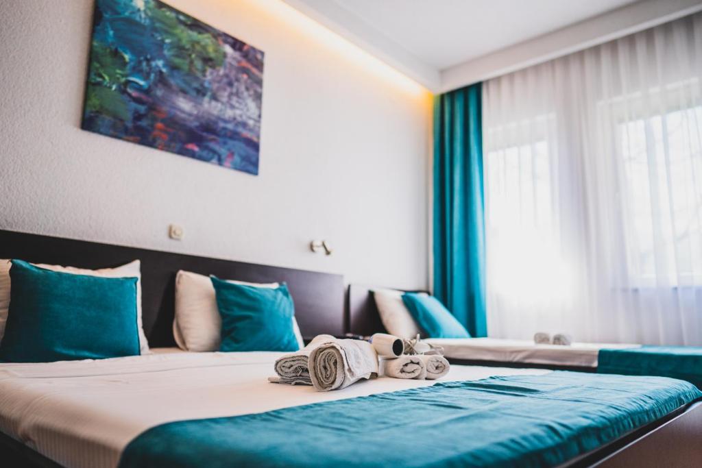 Postel nebo postele na pokoji v ubytování Villa Stefano
