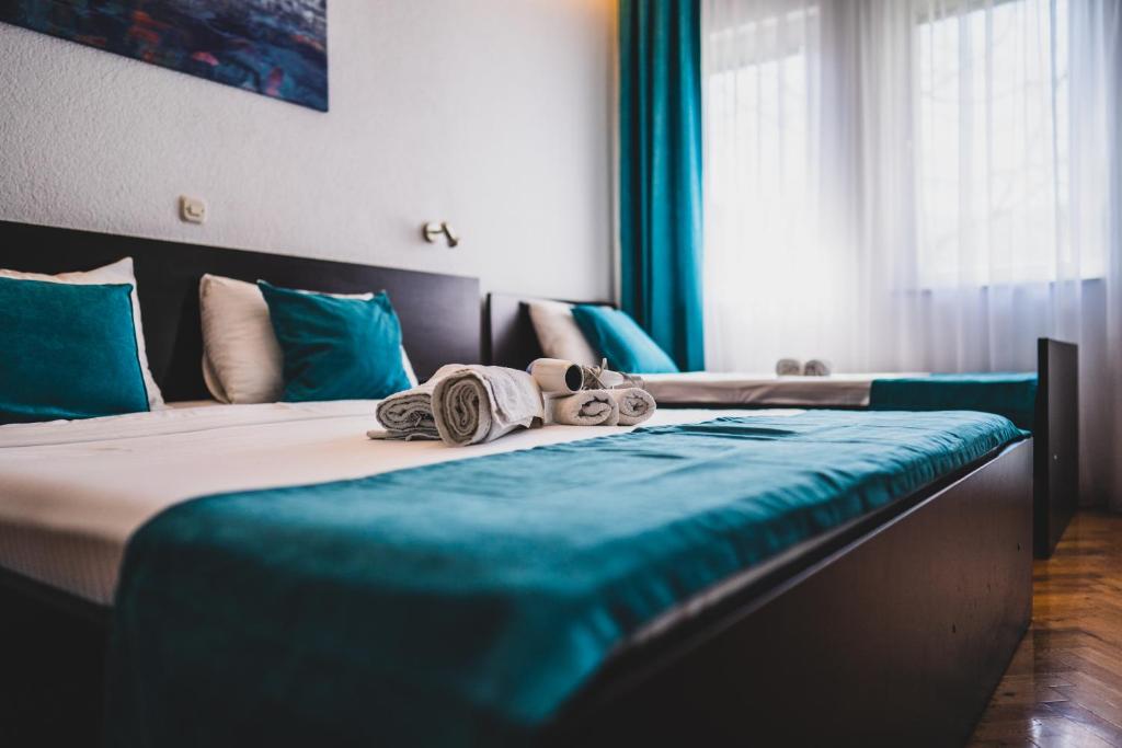 Postel nebo postele na pokoji v ubytování Villa Stefano