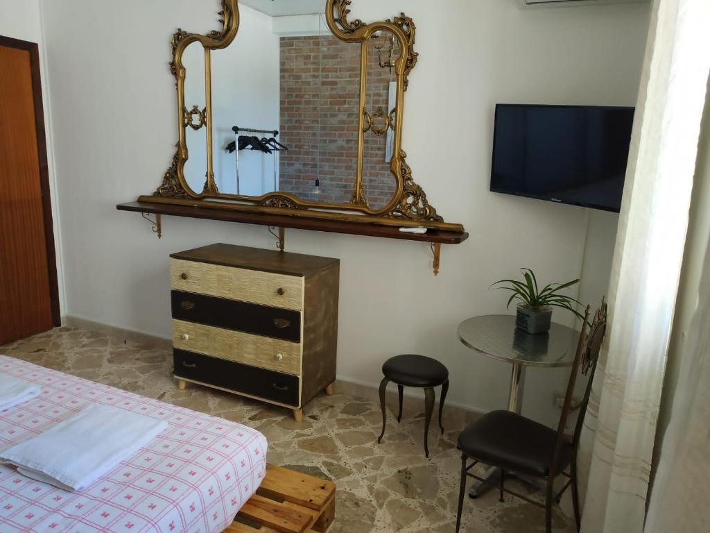 TV a/nebo společenská místnost v ubytování Tilde B&B