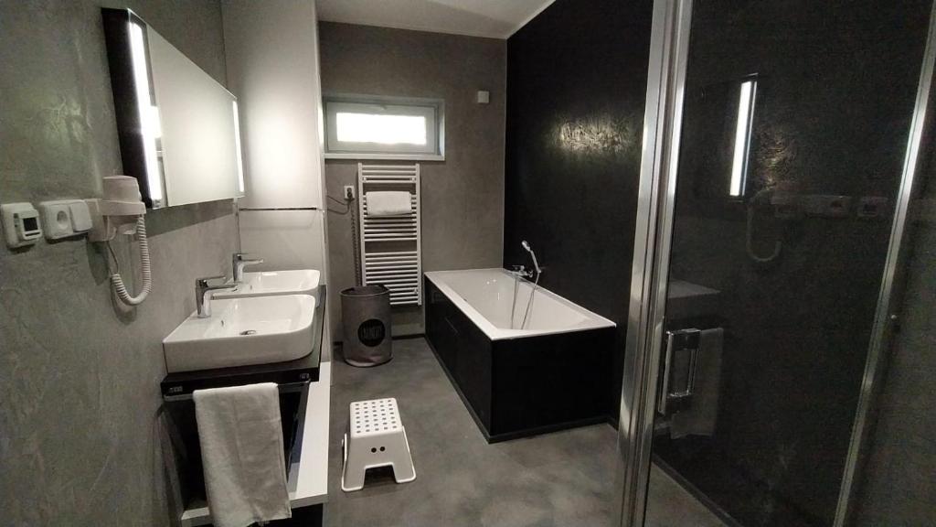 Koupelna v ubytování Apartmány U tří bratrů