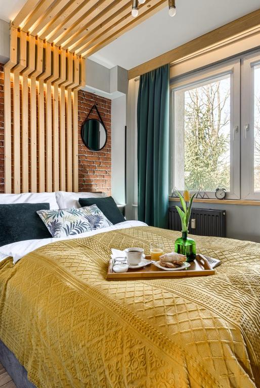 Posteľ alebo postele v izbe v ubytovaní Apartament Alicja, ścisłe centrum, Orkana 3
