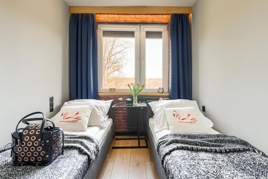 Posteľ alebo postele v izbe v ubytovaní Apartament Alicja, ścisłe centrum, Orkana 3