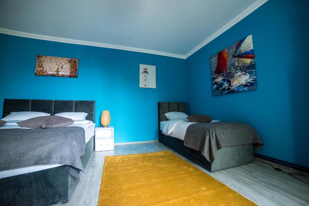 Postel nebo postele na pokoji v ubytování COMPLEX LIVING
