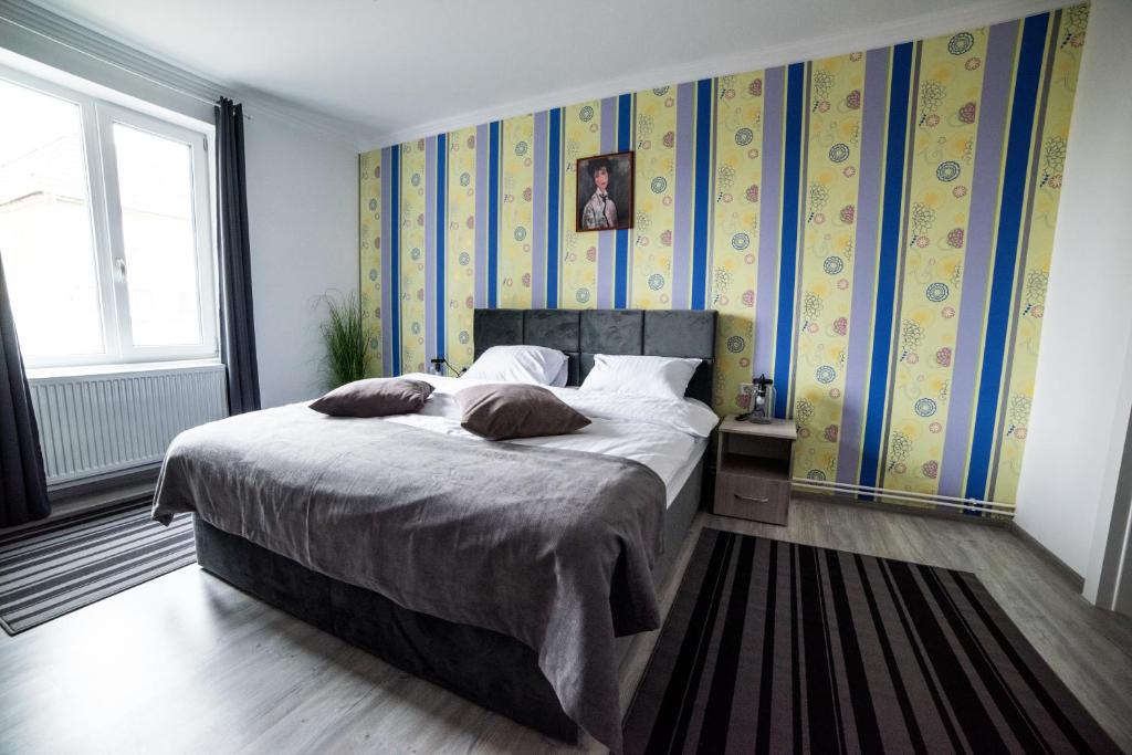 Postel nebo postele na pokoji v ubytování COMPLEX LIVING