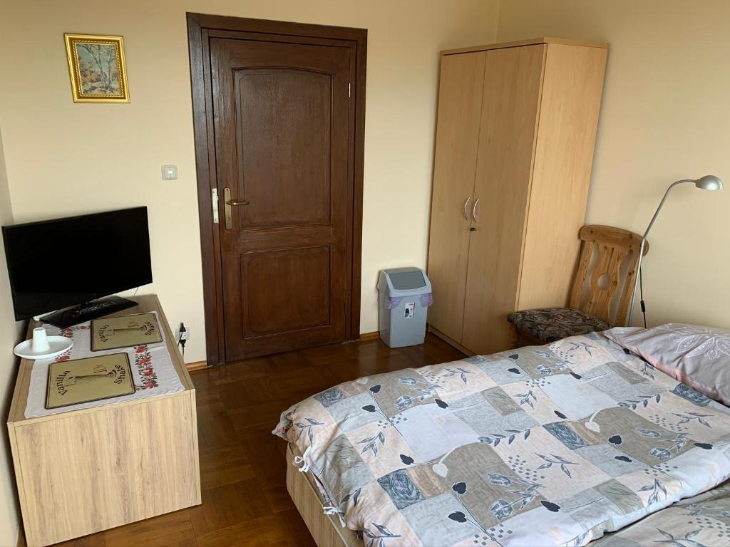 Posteľ alebo postele v izbe v ubytovaní DOM KKK