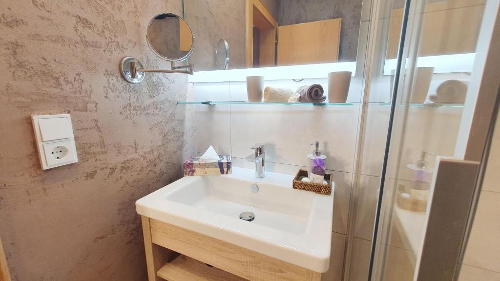 Koupelna v ubytování Appartements-Pension Reinstadler