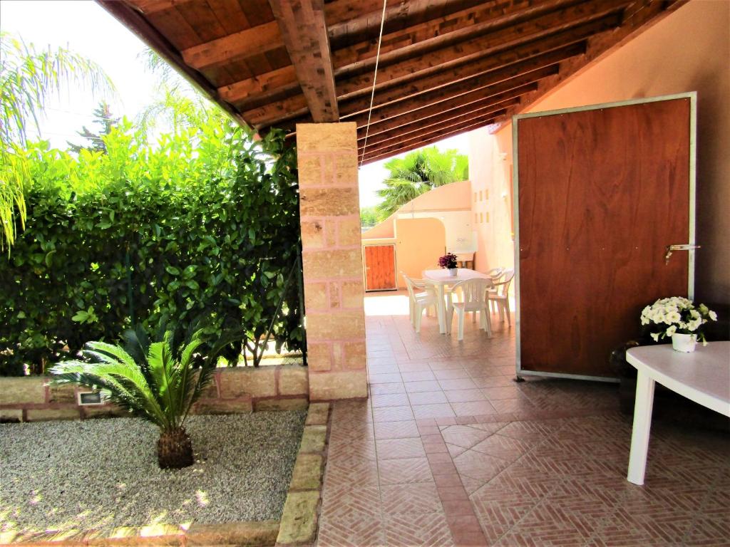 Jardín al aire libre en 2 bedrooms house at Torre San Giovanni 700 m away from the beach with enclosed garden and wifi