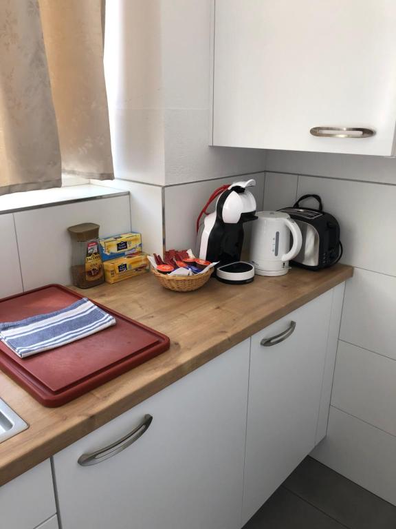 Kuchyň nebo kuchyňský kout v ubytování Apartment Italy