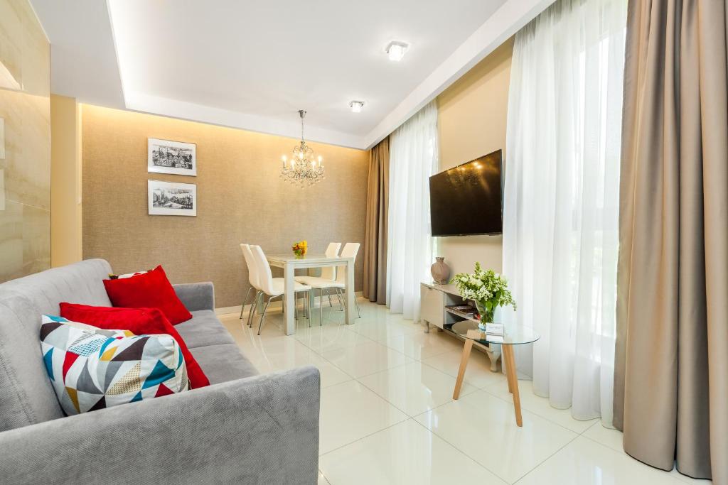 Televízia a/alebo spoločenská miestnosť v ubytovaní Happy Stay OldNova Deluxe Apartment 335
