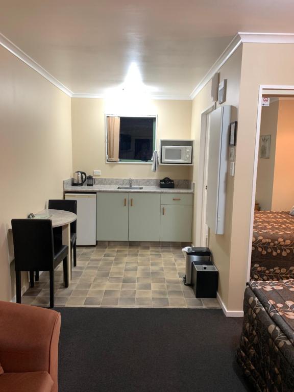 Kuchyň nebo kuchyňský kout v ubytování Aldan Lodge
