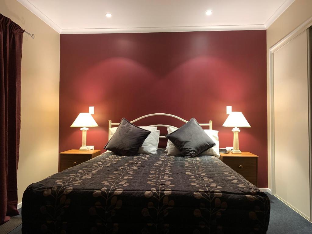 Postel nebo postele na pokoji v ubytování Aldan Lodge