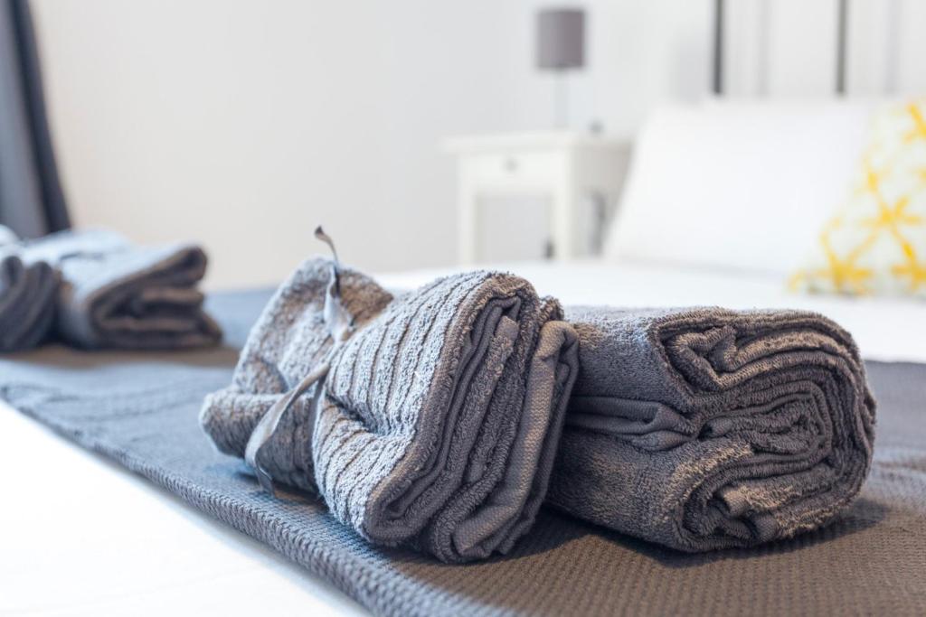 A bed or beds in a room at Boutique Apartments in the Heart of Madrid