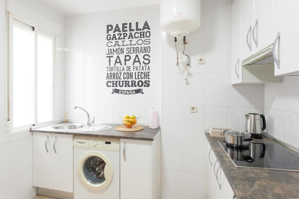 A kitchen or kitchenette at Boutique Apartments in the Heart of Madrid