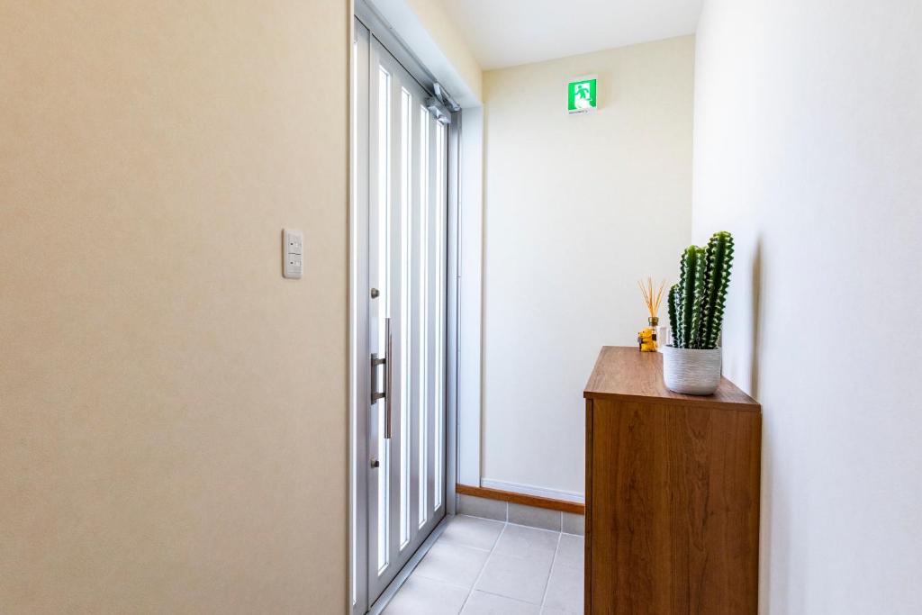 Fotografie z fotogalerie ubytování Condominium Luana 築浅2LDK 宮城海岸徒歩2分 American Village 車で10分 v destinaci Čatan