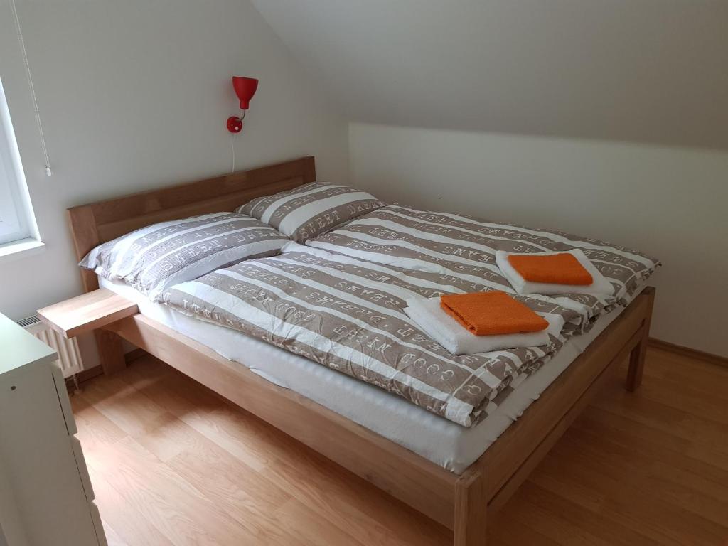 Postel nebo postele na pokoji v ubytování Holiday House Tereza