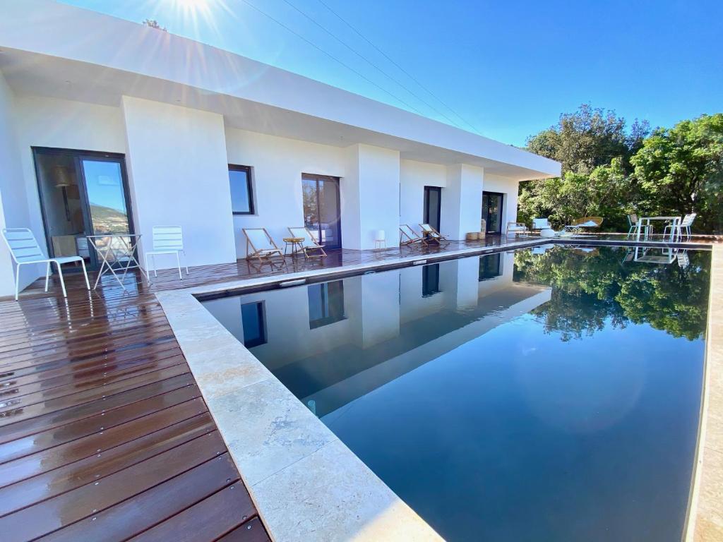Bazén v ubytování Villas de standing avec magnifique vue mer et piscines privées, Sagone nebo v jeho okolí