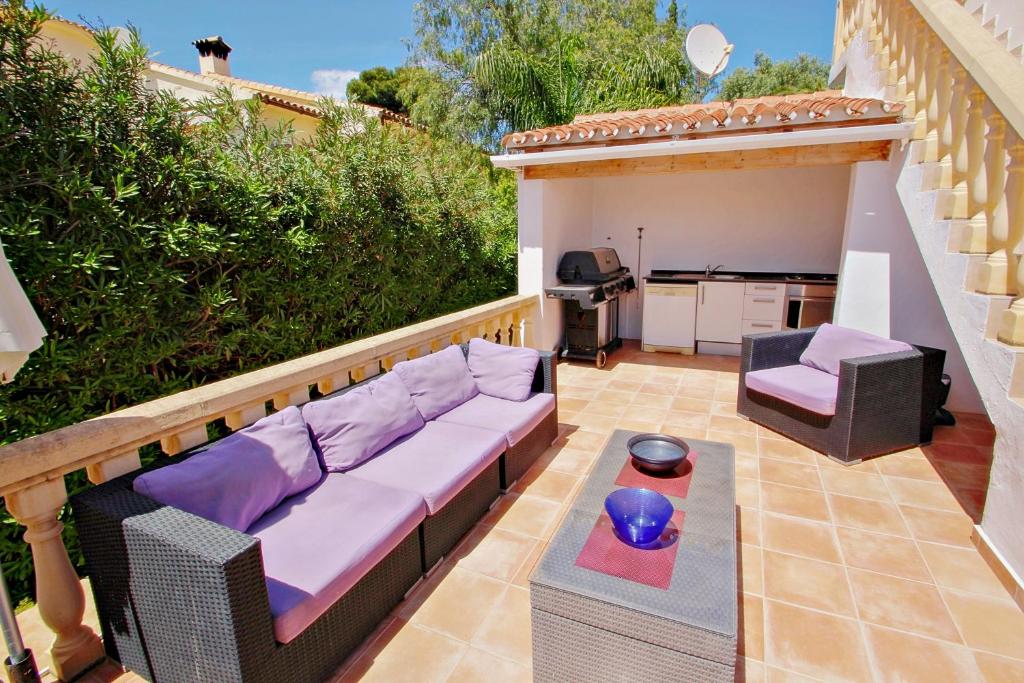 A seating area at Michelle - sea view villa with private pool in Benissa