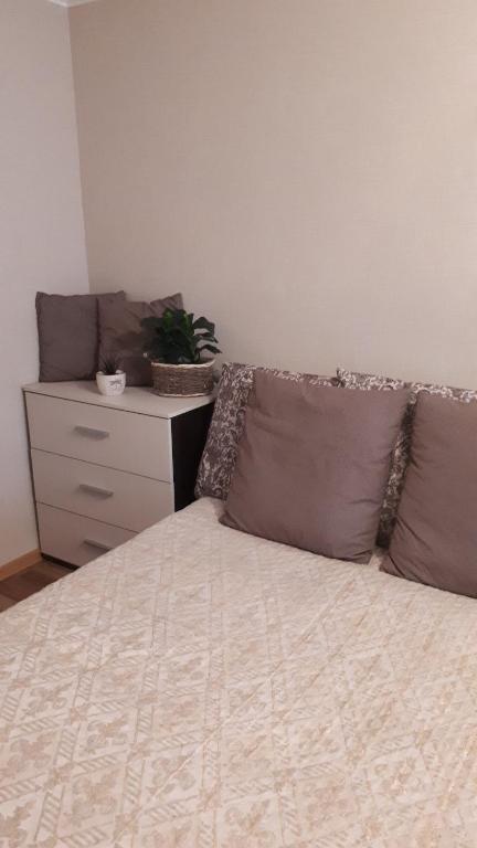 Кровать или кровати в номере Apartment on Lenina