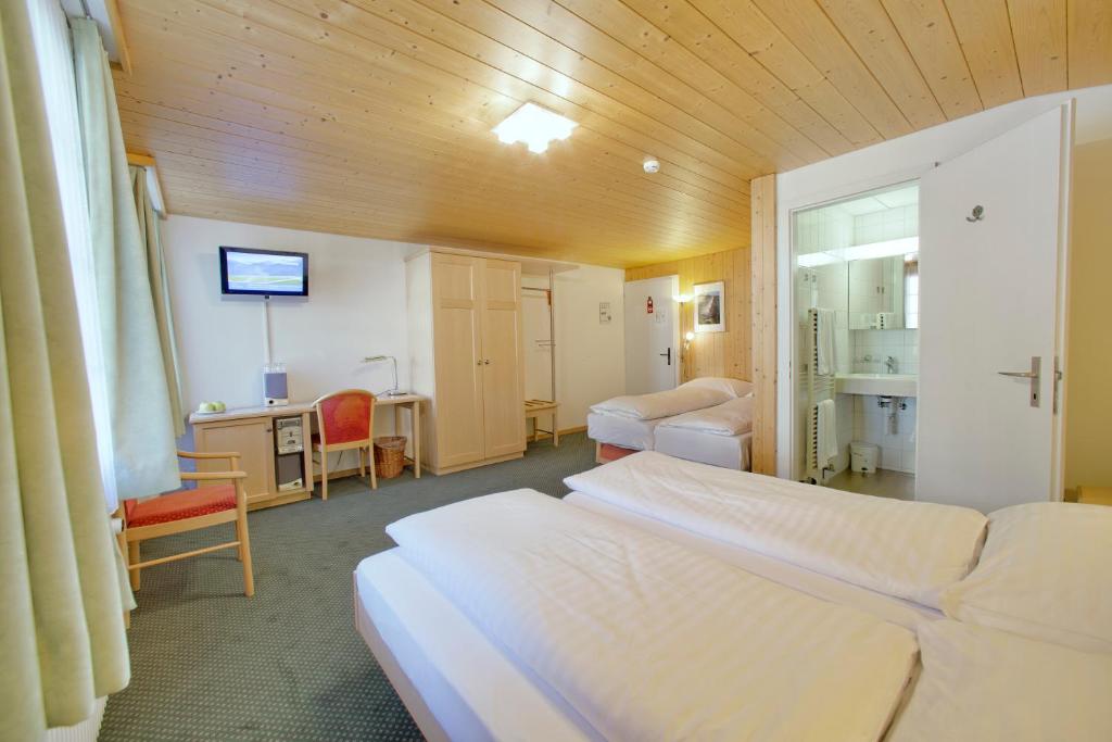Postel nebo postele na pokoji v ubytování Hotel Alpenruh