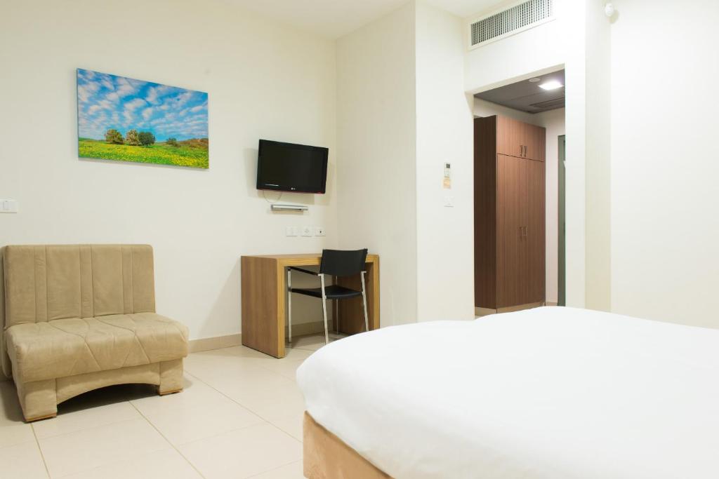 TV a/nebo společenská místnost v ubytování HI - Poriya Hostel
