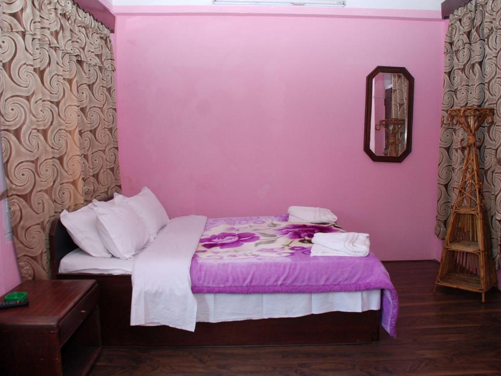Postel nebo postele na pokoji v ubytování Hotel Travelers Home