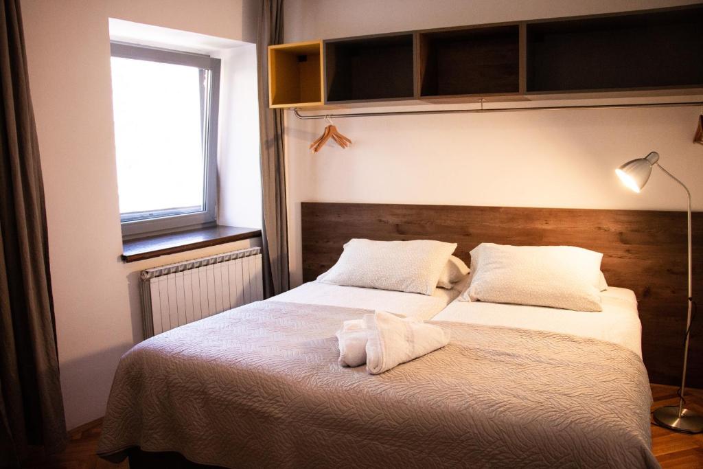 Postel nebo postele na pokoji v ubytování Hostel Museum