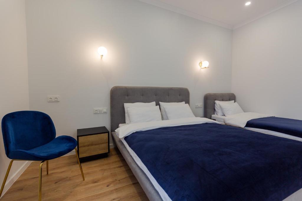 Postel nebo postele na pokoji v ubytování Hotel Lifetime