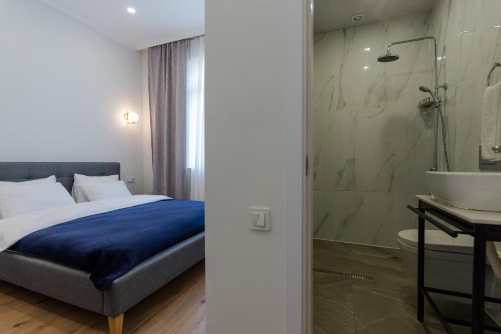 Postel nebo postele na pokoji v ubytování Hotel Lifetime