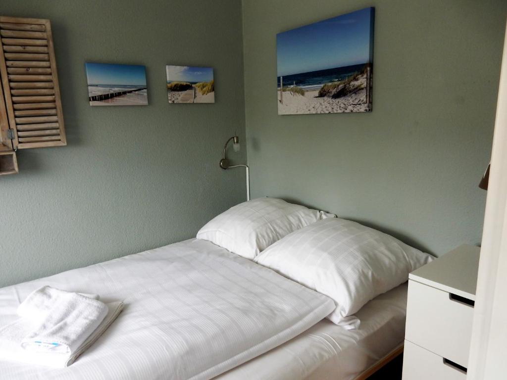 Postel nebo postele na pokoji v ubytování Ostseekrabbe-Timmendorfer Strand , strandnah , Wlan , Parkplatz