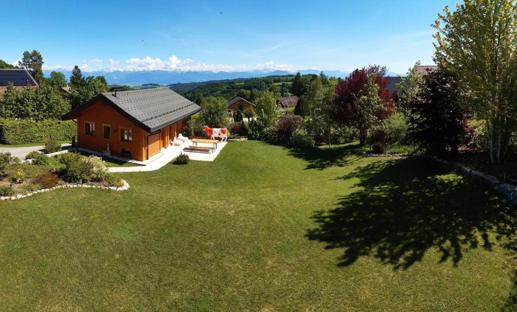 an aerial view of a house in a yard at The Guesthouse in Saint-George