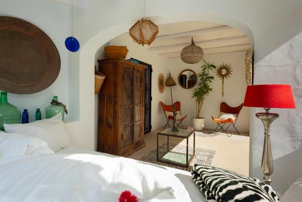 Postel nebo postele na pokoji v ubytování Caballito de Mar Boutique Hotel