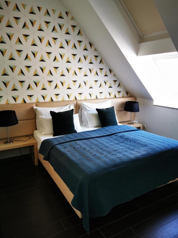 Posteľ alebo postele v izbe v ubytovaní Rafael Kaiser Premium Apartments - Contactless 24h Check-In