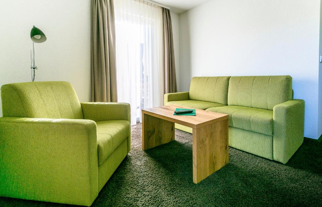 Posezení v ubytování Hotel-Restaurant Sennhütte im Herzen des Südschwarzwalds