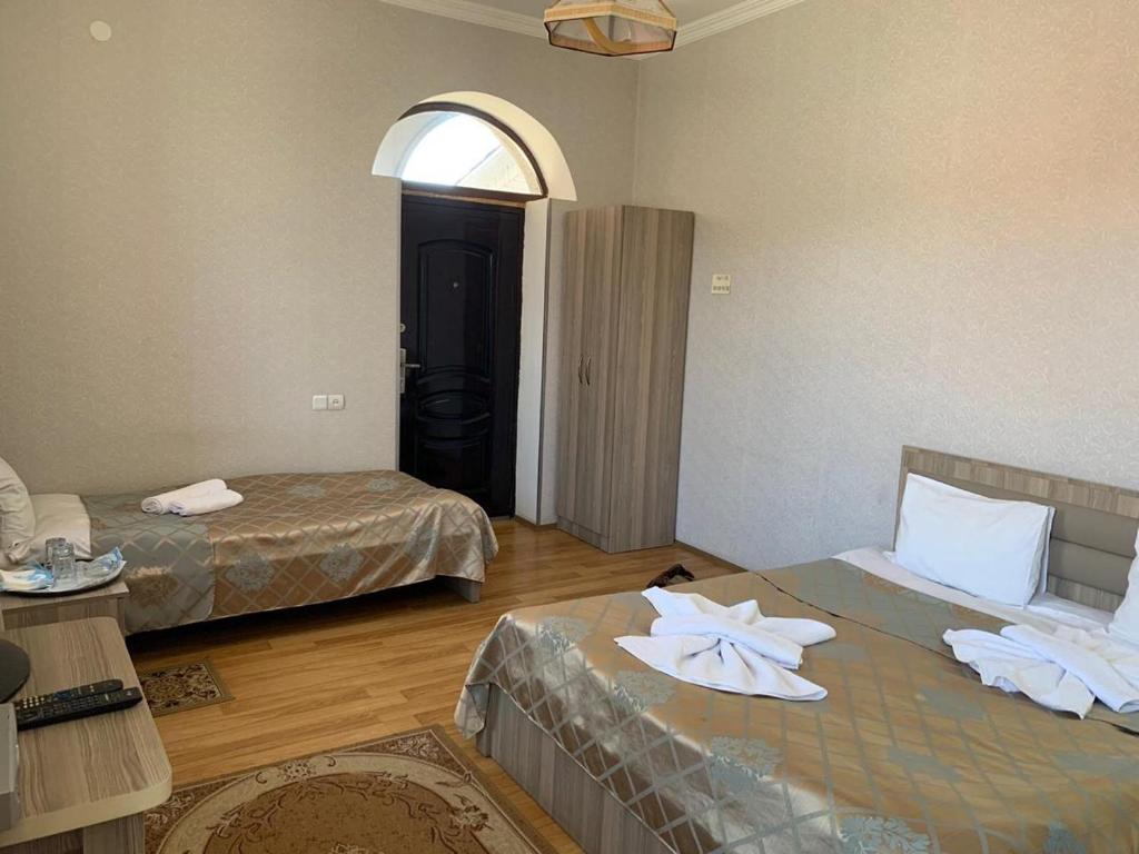 Postel nebo postele na pokoji v ubytování Old Town Akhaltsikhe