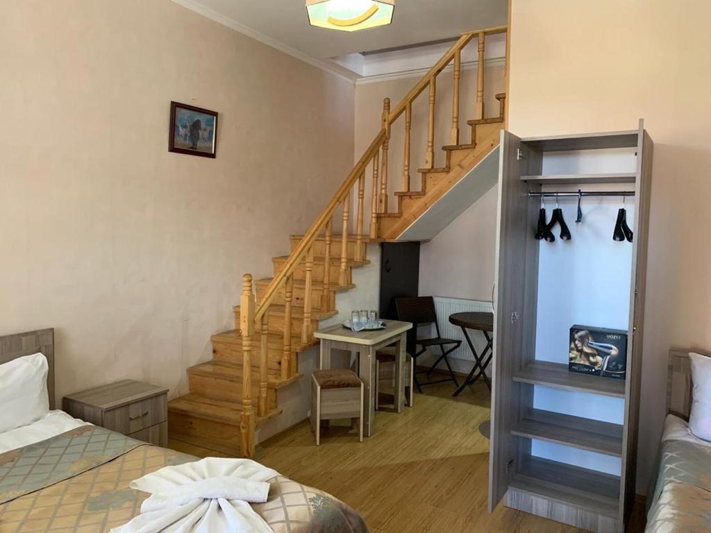 Postel nebo postele na pokoji v ubytování Old Town Akhaltsikhe