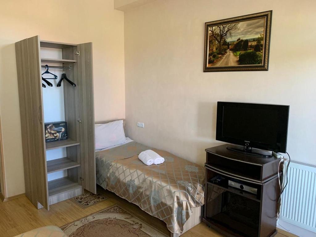 Postel nebo postele na pokoji v ubytování Old Town Akhaltsikhe
