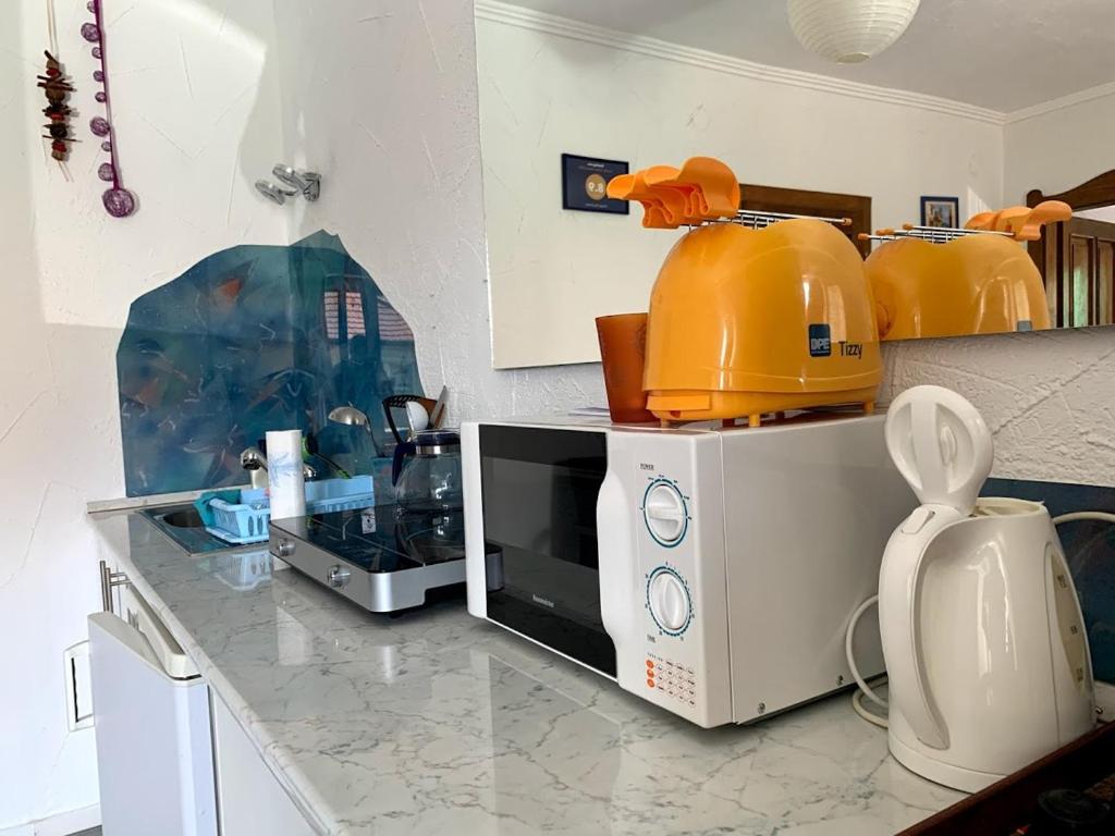 Kuchnia lub aneks kuchenny w obiekcie Jorgos Apartman