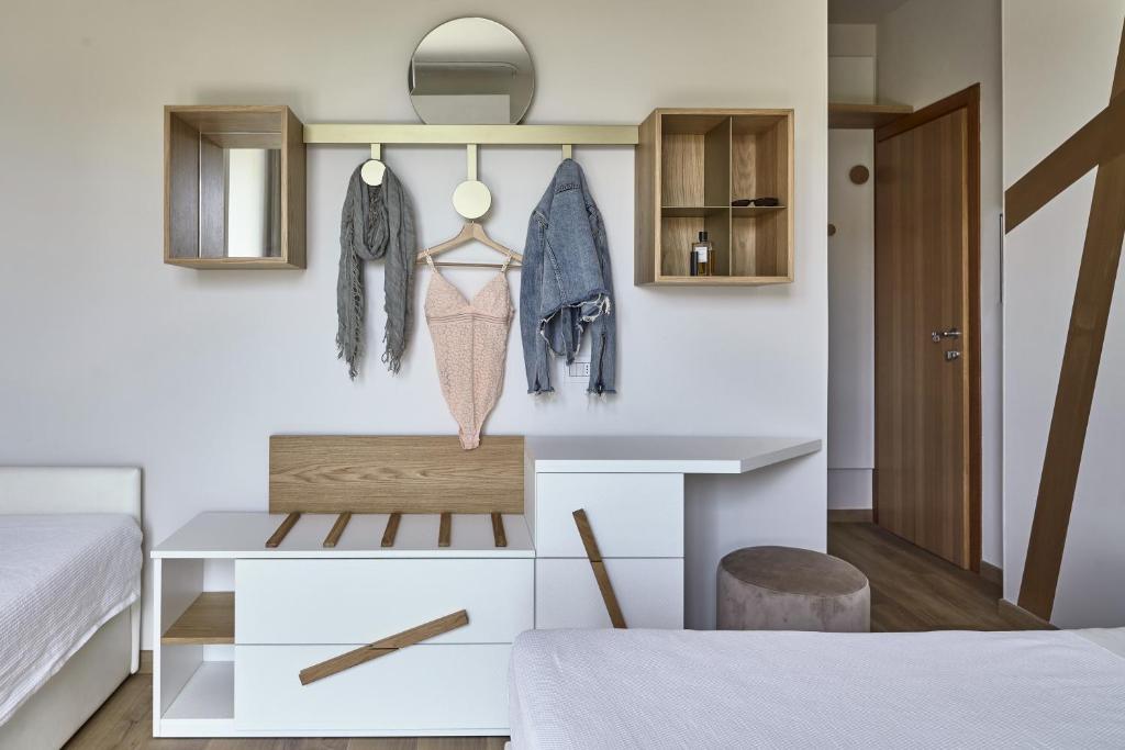 Postel nebo postele na pokoji v ubytování Hotel La Fenice