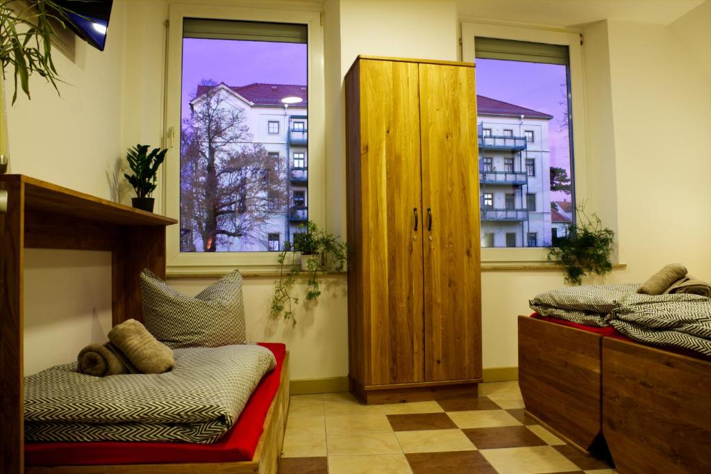 Postel nebo postele na pokoji v ubytování KL17 Ostel Döbeln