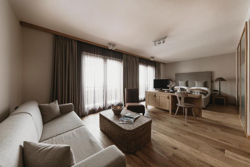 TV a/nebo společenská místnost v ubytování Eco & Wellness Boutique Hotel Sonne