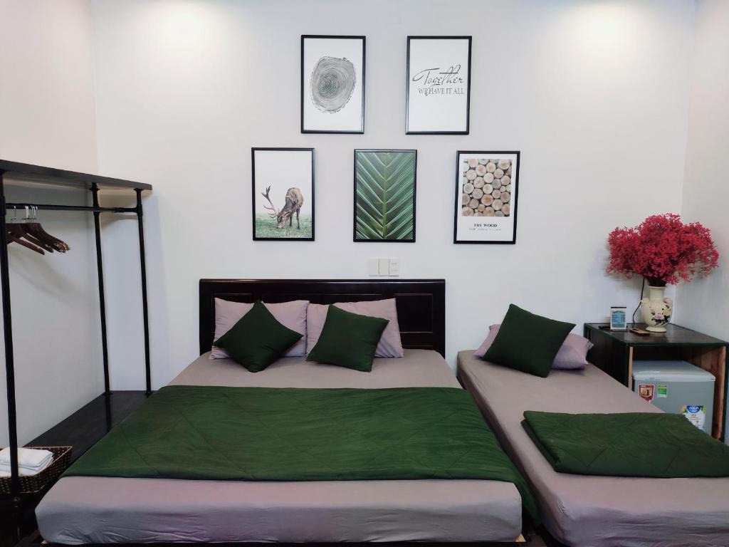 Postel nebo postele na pokoji v ubytování Kon-Tiki DaNang Hostel