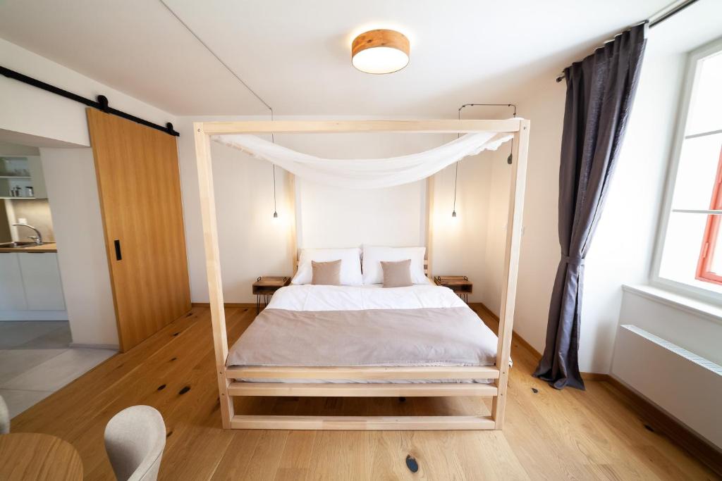 Postel nebo postele na pokoji v ubytování Apartmány Dačický 1