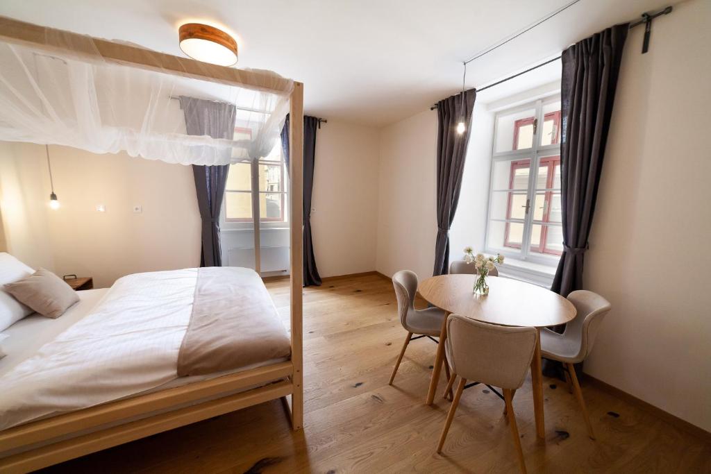 Postel nebo postele na pokoji v ubytování Apartmány Dačický 1