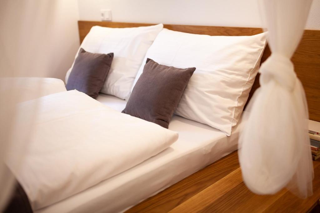 Postel nebo postele na pokoji v ubytování Apartmány Dačický 1